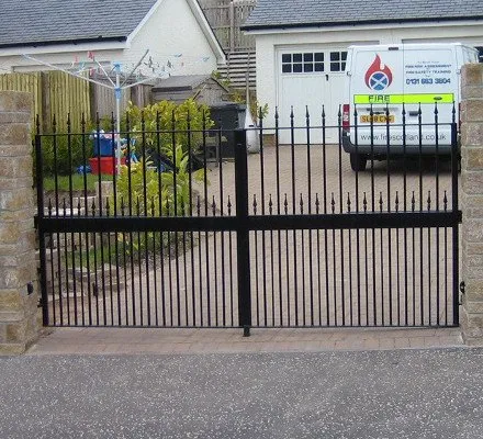 Garden gates leading to driveway